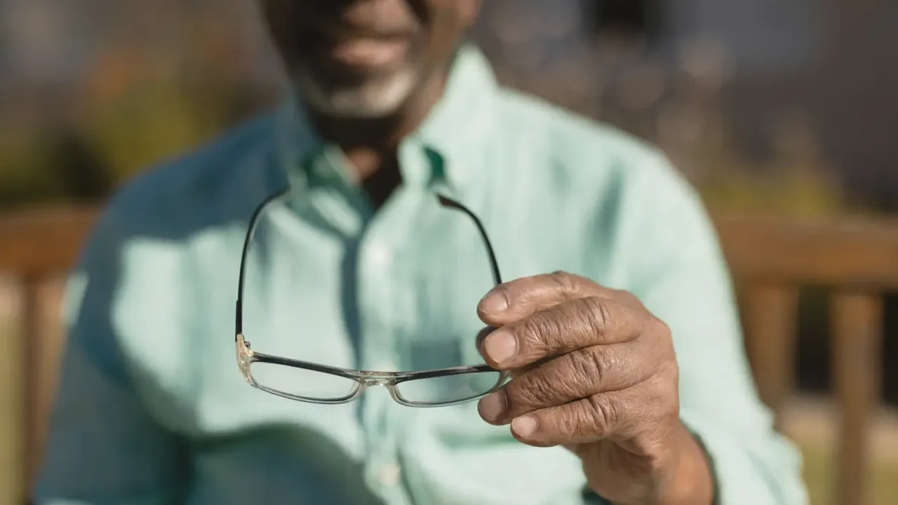 Reading glasses man smiling