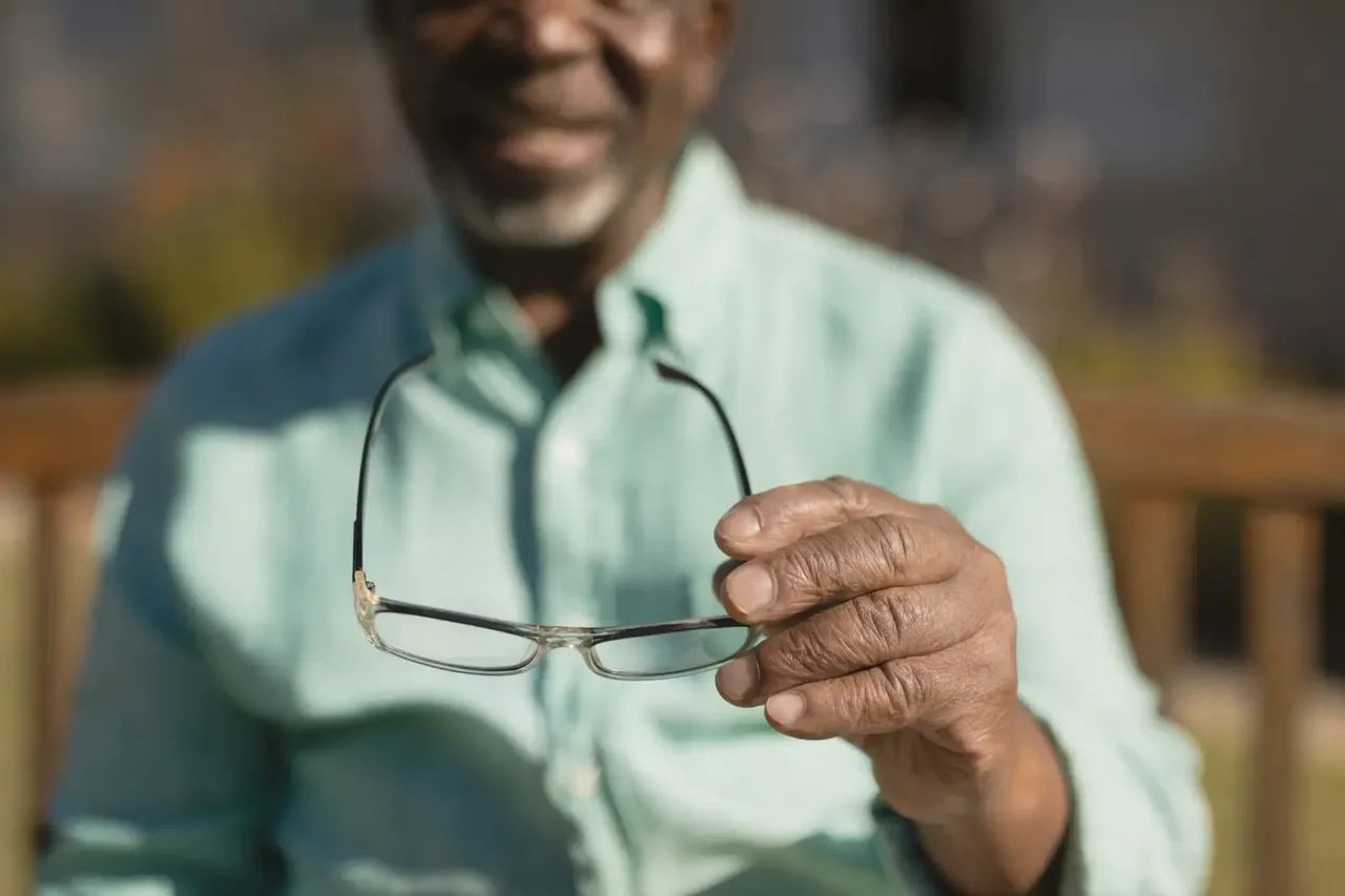 Reading glasses man smiling