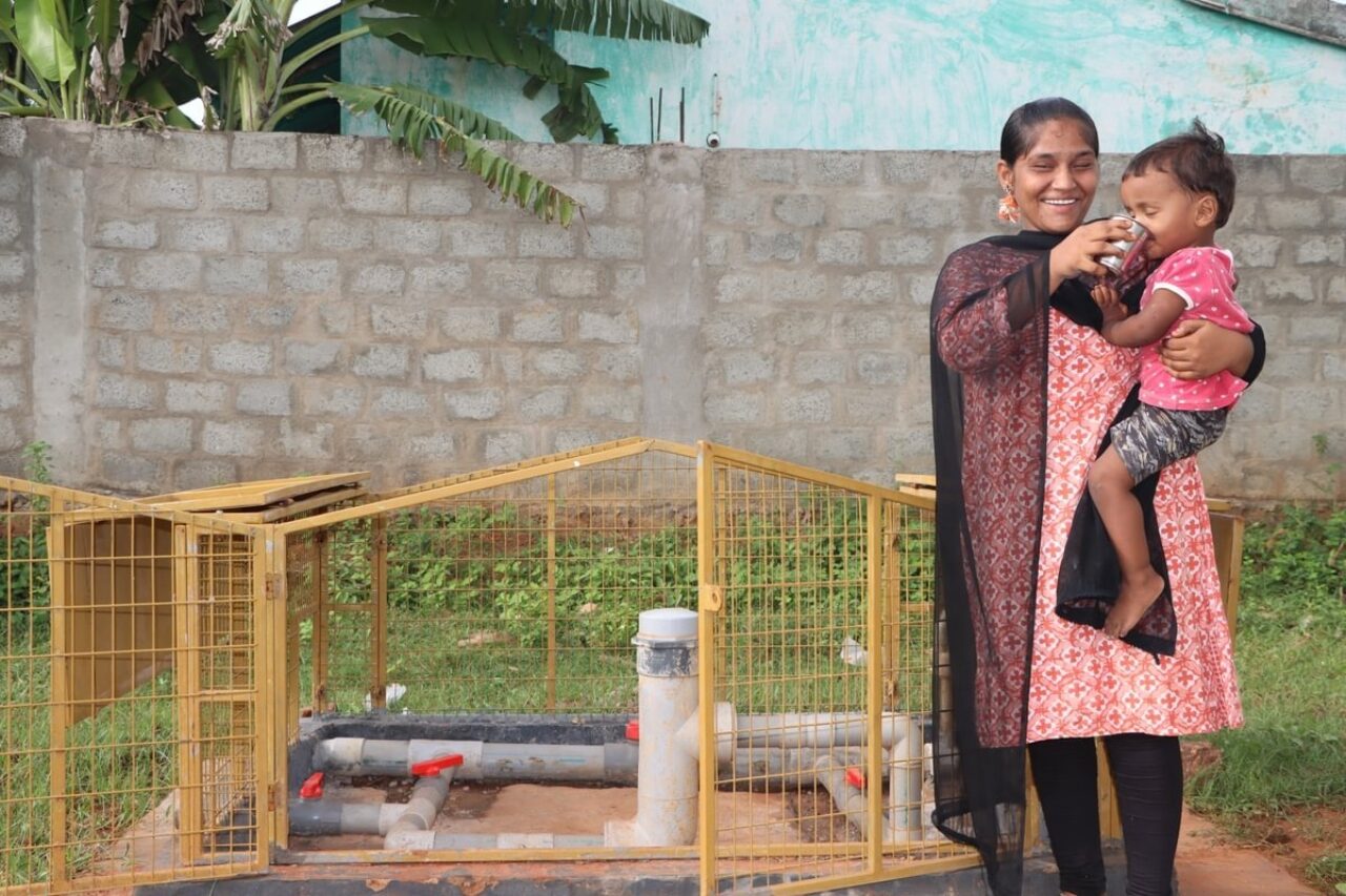 Community from Andhra Pradesh standing near devices Medium